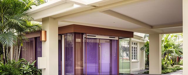 Singapore office entrance on Jubilee Road with a clear business frontage and shaded walkway